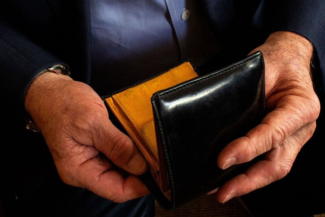 Our CEO's Billfold Wallet repair process after 18 years of use